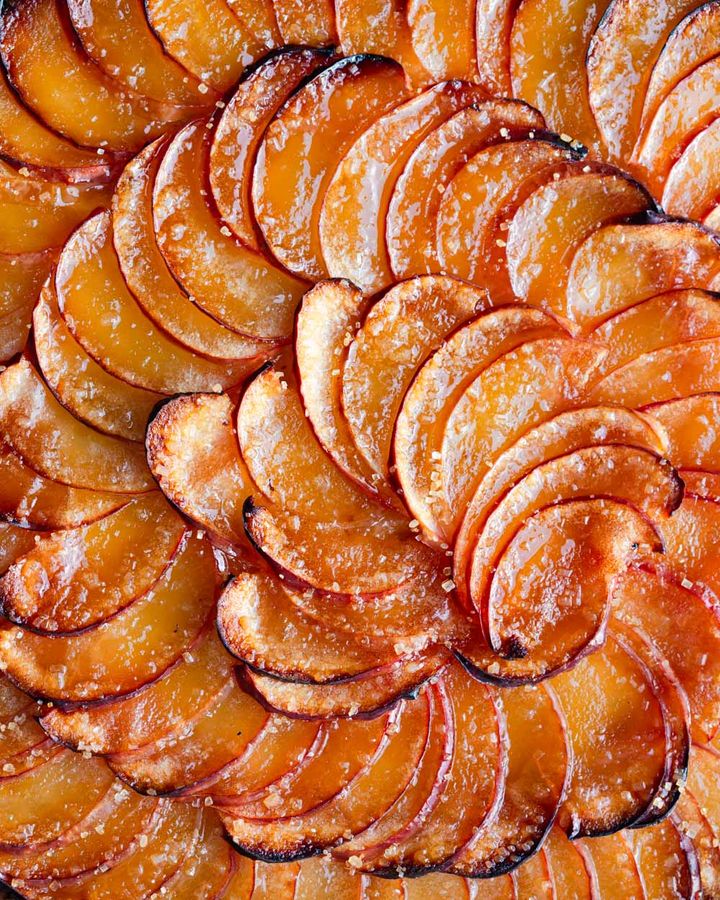 Close up of apple tart with sweet caramel glaze